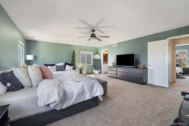 carpeted bedroom with a ceiling fan