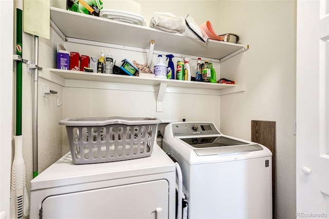 laundry area featuring washer and clothes dryer