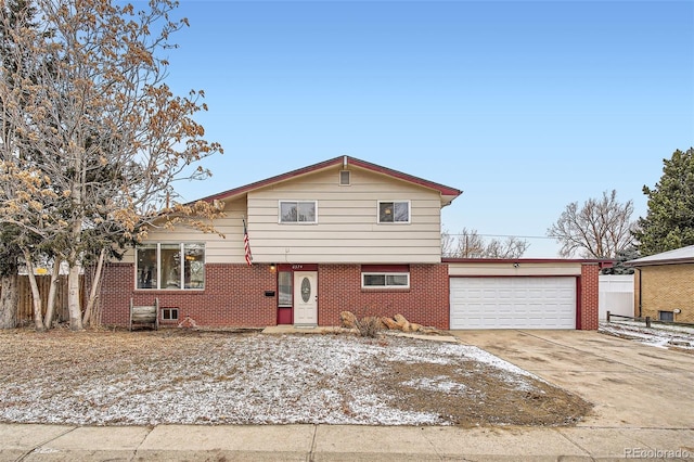 tri-level home featuring a garage