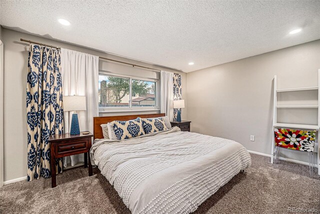 7005 Zenobia Pl, Westminster, CO 80030 - carpeted bedroom featuring recessed lighting, a textured ceiling, and baseboards