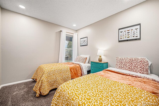 7005 Zenobia Pl, Westminster, CO 80030 - carpeted bedroom with recessed lighting, baseboards, and a textured ceiling