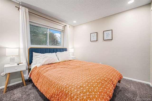 7005 Zenobia Pl, Westminster, CO 80030 - bedroom with baseboards, carpet flooring, recessed lighting, and a textured ceiling