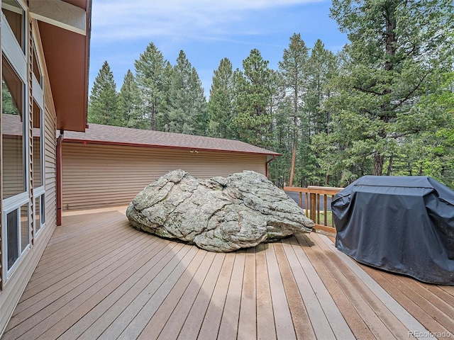 7585 Native Dancer Trl, Evergreen, CO 80439 - wooden deck featuring area for grilling