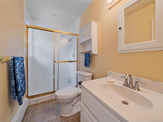 7585 Native Dancer Trl, Evergreen, CO 80439 - bathroom featuring vanity, a shower stall, toilet, and baseboards