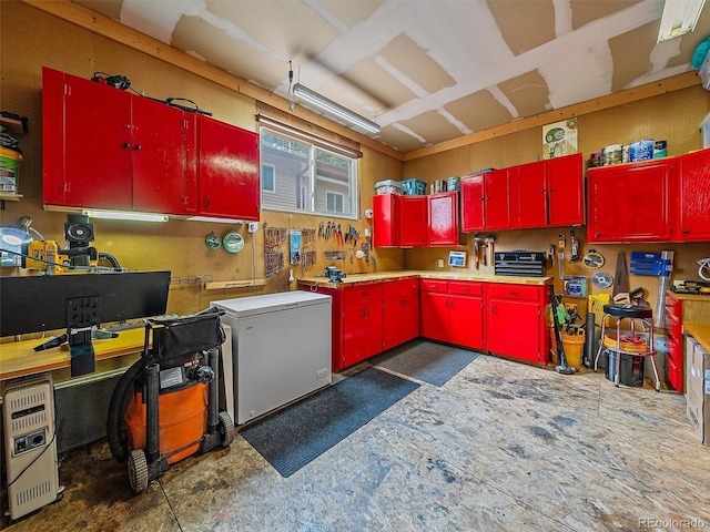 7585 Native Dancer Trl, Evergreen, CO 80439 - kitchen with red cabinetry and white fridge