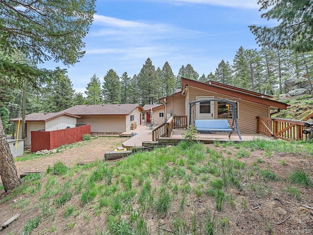7585 Native Dancer Trl, Evergreen, CO 80439 - rear view of property featuring a deck