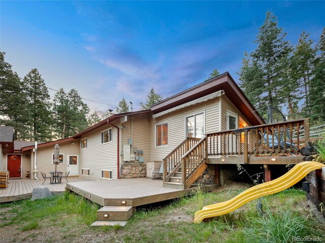 7585 Native Dancer Trl, Evergreen, CO 80439 - rear view of property featuring a deck