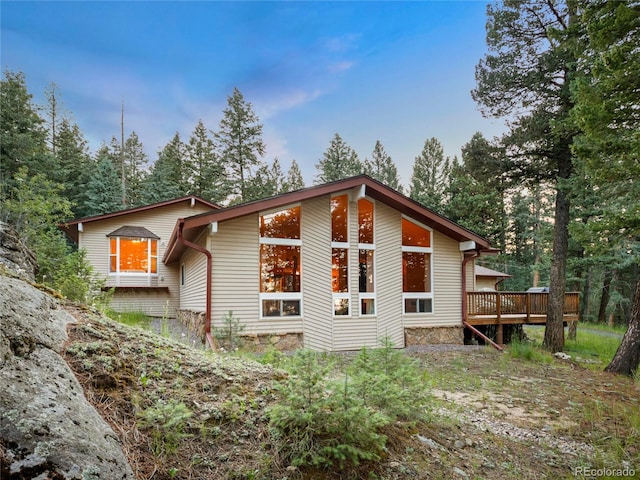 7585 Native Dancer Trl, Evergreen, CO 80439 - view of property exterior featuring a deck