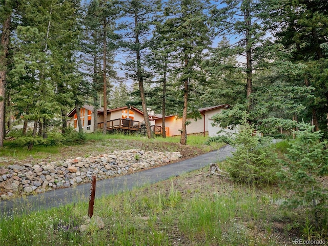 7585 Native Dancer Trl, Evergreen, CO 80439 - view of front of property featuring a deck