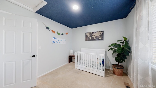 21570 E 40th Pl, Denver, CO 80249 - bedroom with carpet flooring and a nursery area