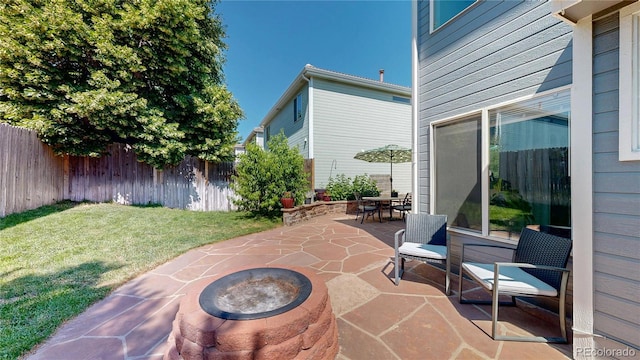 21570 E 40th Pl, Denver, CO 80249 - fenced backyard featuring a patio area