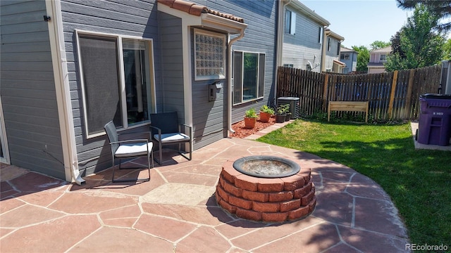 21570 E 40th Pl, Denver, CO 80249 - view of patio / terrace with a fire pit