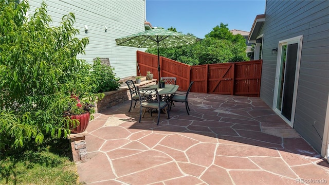 21570 E 40th Pl, Denver, CO 80249 - view of patio / terrace featuring outdoor dining area