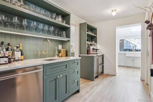 435 Ivanhoe St, Denver, CO 80220 - bar area with stainless steel dishwasher and light wood-type flooring
