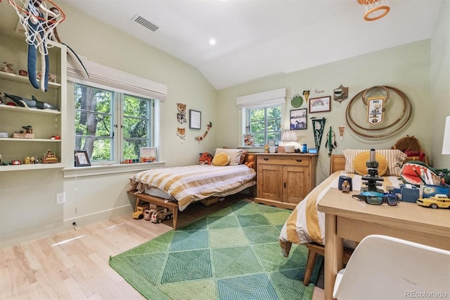 435 Ivanhoe St, Denver, CO 80220 - bedroom featuring wood finished floors and vaulted ceiling