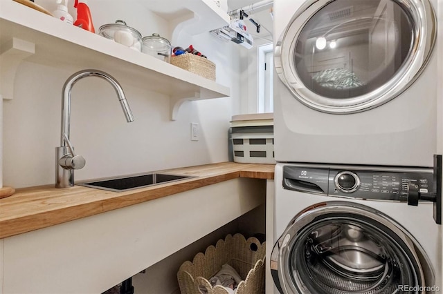 435 Ivanhoe St, Denver, CO 80220 - laundry room with stacked washer / drying machine