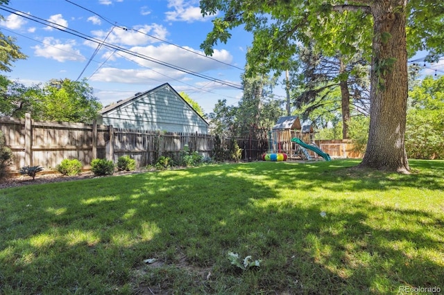 435 Ivanhoe St, Denver, CO 80220 - fenced backyard featuring a playground