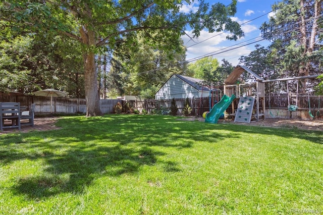 435 Ivanhoe St, Denver, CO 80220 - fenced backyard featuring a playground