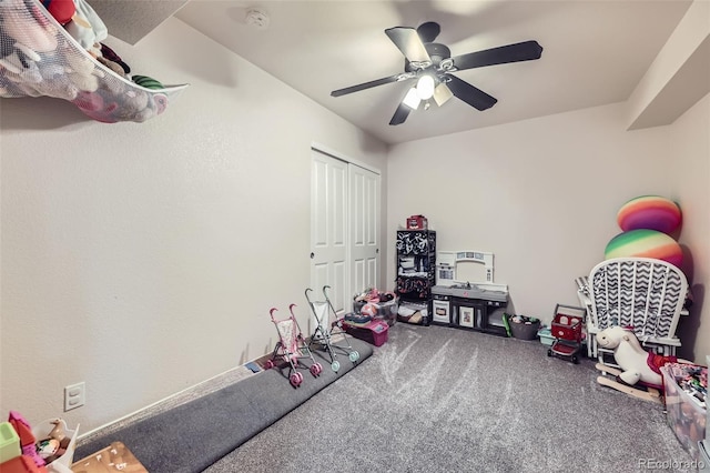 recreation room with a ceiling fan