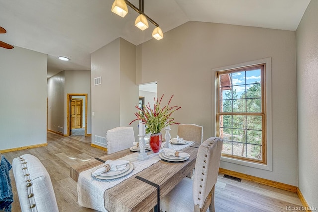 318 Southgate Rd, Florissant, CO 80816 - dining space with light wood-style flooring, baseboards, lofted ceiling, and ceiling fan