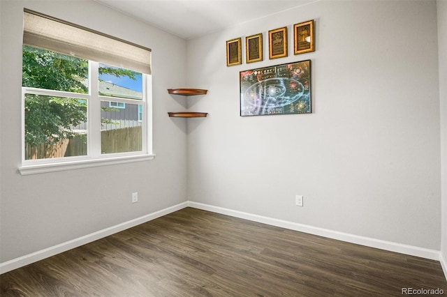 7956 Osage St, Denver, CO 80221 - spare room featuring dark wood-style floors