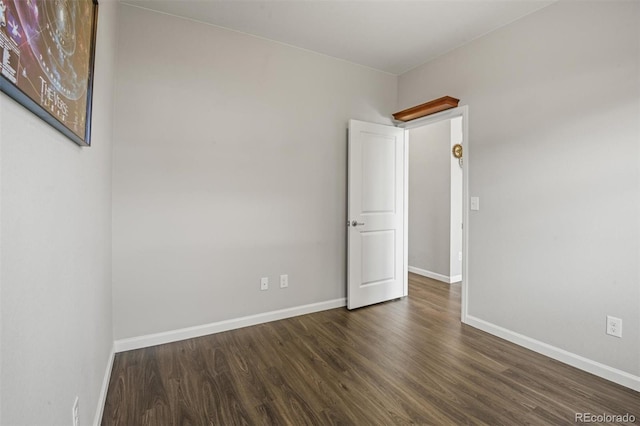 7956 Osage St, Denver, CO 80221 - unfurnished room featuring wood finished floors and baseboards
