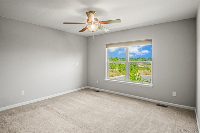 7956 Osage St, Denver, CO 80221 - spare room featuring a ceiling fan and carpet