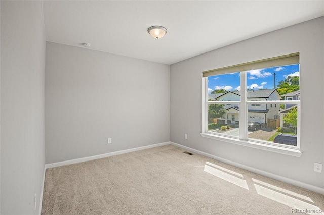 7956 Osage St, Denver, CO 80221 - carpeted spare room with baseboards