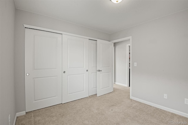 7956 Osage St, Denver, CO 80221 - unfurnished bedroom featuring carpet flooring and a closet