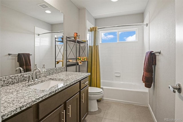 7956 Osage St, Denver, CO 80221 - full bathroom featuring vanity, tile patterned floors, and shower / bathtub combination with curtain