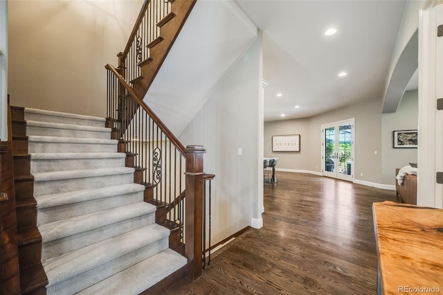 2362 Spruce Way, Denver, CO 80238 - stairs with wood finished floors, recessed lighting, baseboards, and arched walkways