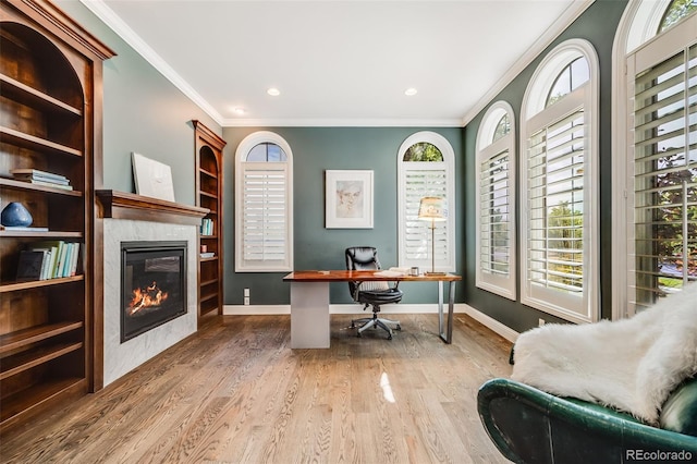 2362 Spruce Way, Denver, CO 80238 - office area with ornamental molding, wood finished floors, a glass covered fireplace, baseboards, and recessed lighting