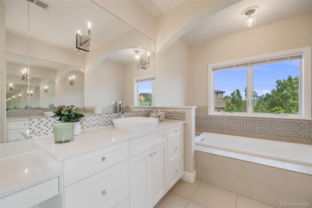 2362 Spruce Way, Denver, CO 80238 - full bathroom with vanity, tile patterned floors, a bath, and decorative backsplash