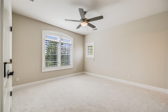 2362 Spruce Way, Denver, CO 80238 - spare room with light carpet, a ceiling fan, and baseboards