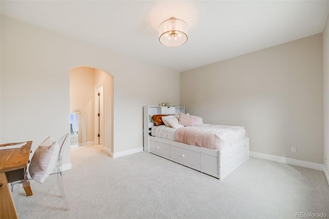 2362 Spruce Way, Denver, CO 80238 - bedroom with arched walkways, carpet, baseboards, and a chandelier