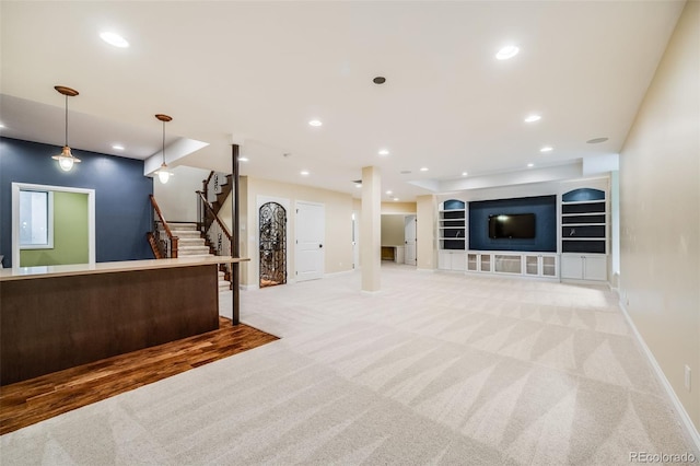 2362 Spruce Way, Denver, CO 80238 - unfurnished living room with light colored carpet, baseboards, stairs, and recessed lighting