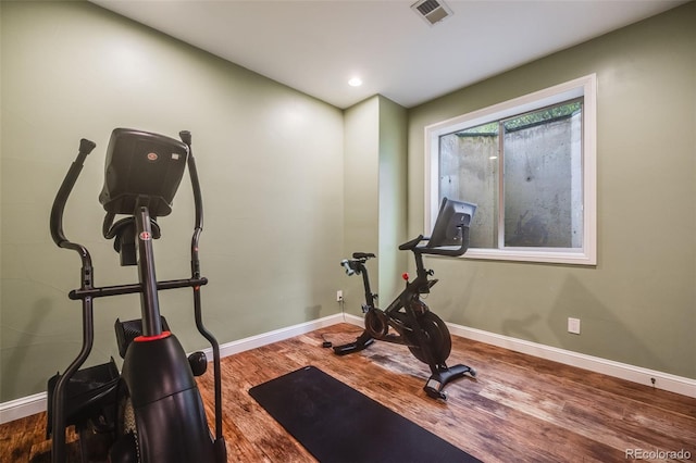 2362 Spruce Way, Denver, CO 80238 - exercise area with wood finished floors, baseboards, and recessed lighting