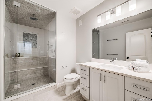 2362 Spruce Way, Denver, CO 80238 - bathroom with vanity, toilet, and a shower stall