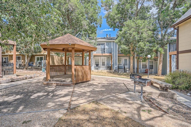 view of home's community featuring a gazebo and a patio