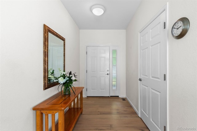1901 S Union Pl, Lakewood, CO 80228 - doorway to outside featuring wood finished floors