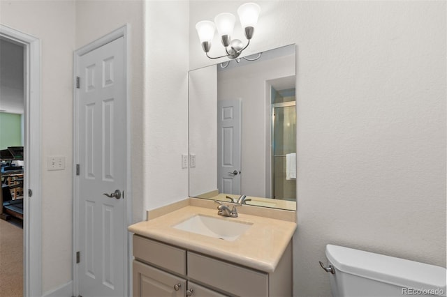 1901 S Union Pl, Lakewood, CO 80228 - full bathroom with vanity, a chandelier, and an enclosed shower