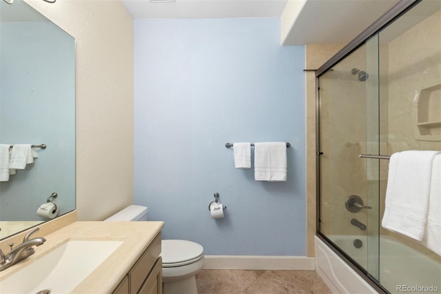 1901 S Union Pl, Lakewood, CO 80228 - full bathroom featuring vanity, shower / bath combination with glass door, and tile patterned floors