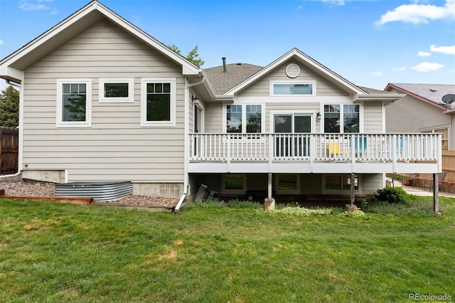 1901 S Union Pl, Lakewood, CO 80228 - rear view of house with a deck and a yard