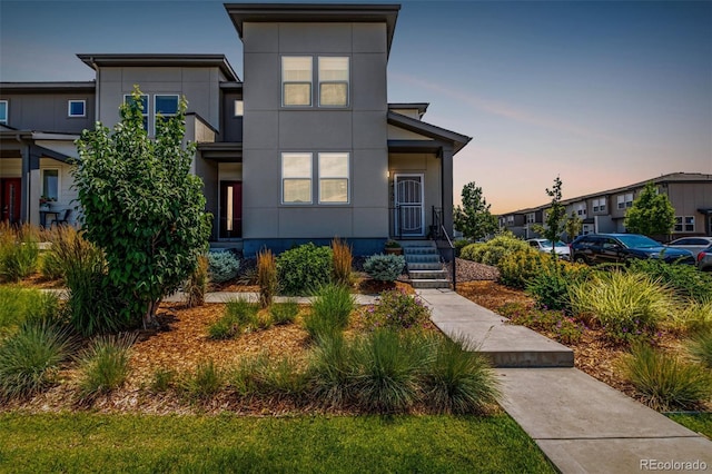 4790 Kittredge St, Denver, CO 80239 - contemporary house with stucco siding