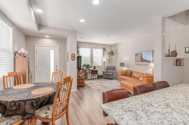 4790 Kittredge St, Denver, CO 80239 - dining space featuring light wood finished floors and recessed lighting