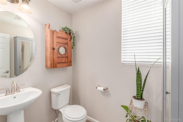 4790 Kittredge St, Denver, CO 80239 - half bath with a sink and toilet