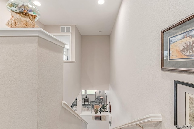 4790 Kittredge St, Denver, CO 80239 - staircase featuring recessed lighting