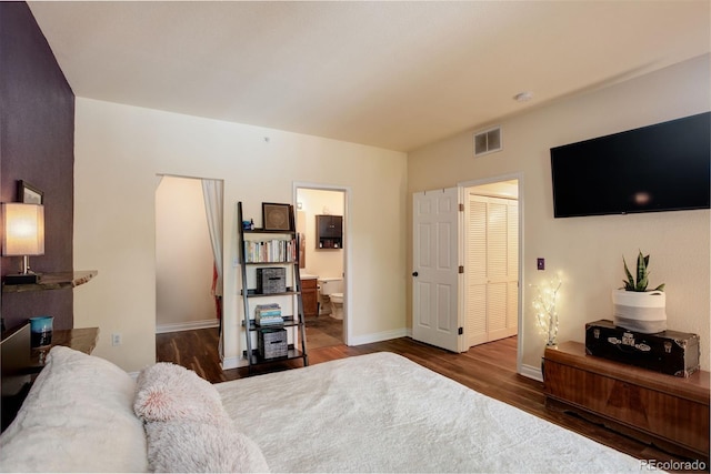 2430 W 82nd Pl Unit 2F, Westminster, CO 80031 - bedroom featuring wood finished floors and baseboards