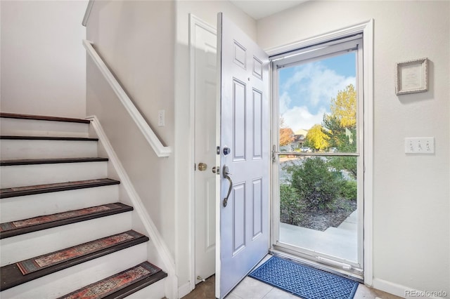 view of tiled foyer entrance