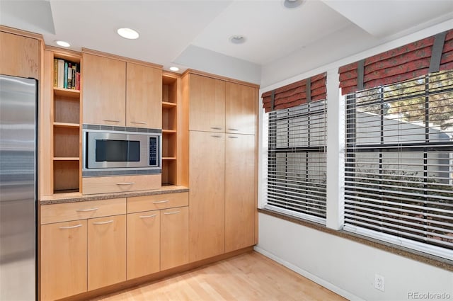 kitchen featuring open shelves, recessed lighting, light brown cabinetry, built in appliances, and light wood-type flooring